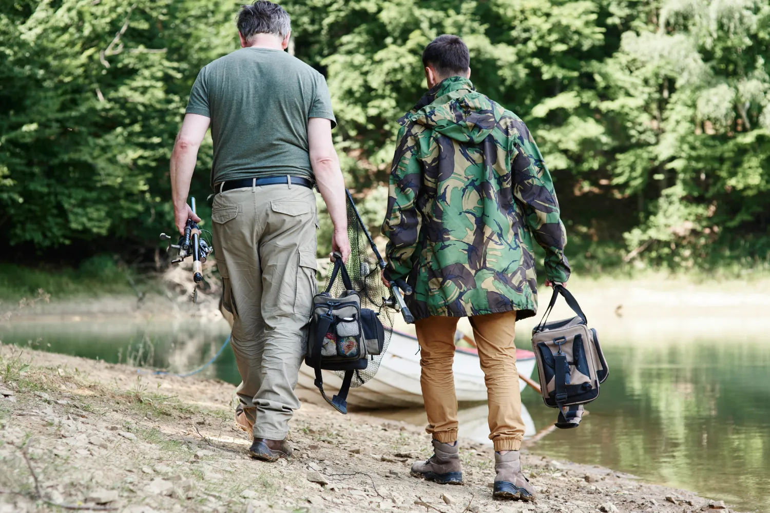 rear-view-fishermen-with-fishing-tackle